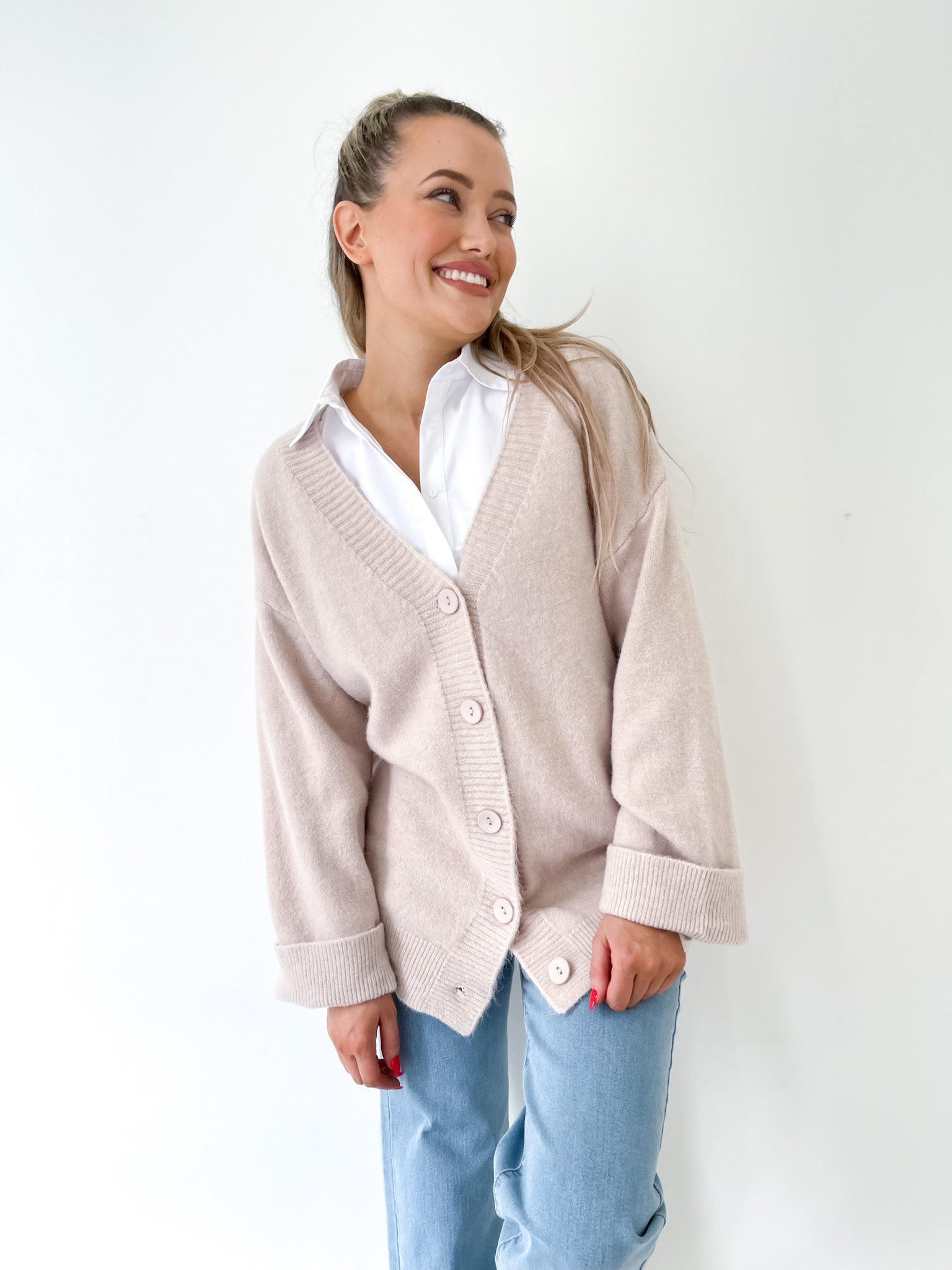 Stone Coloured Winter Cardigan with a generous oversize fit and wide cuffs by Fria the Label
